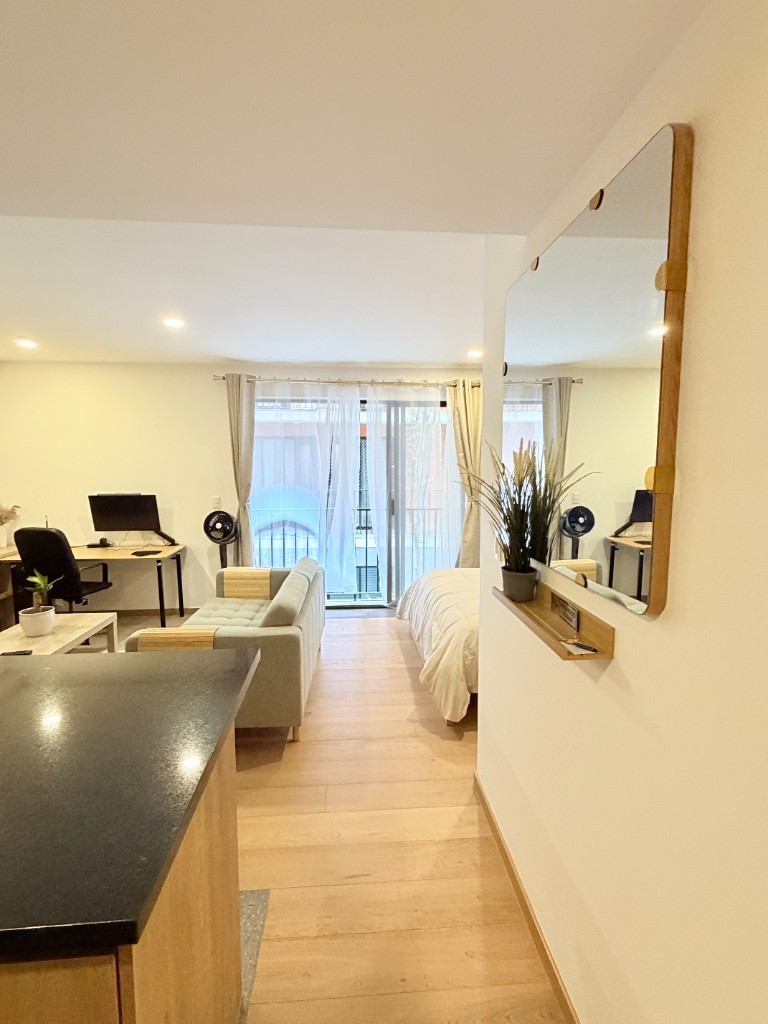 StayWork apartment with desk, living area, and work-ready setup in Mexico City